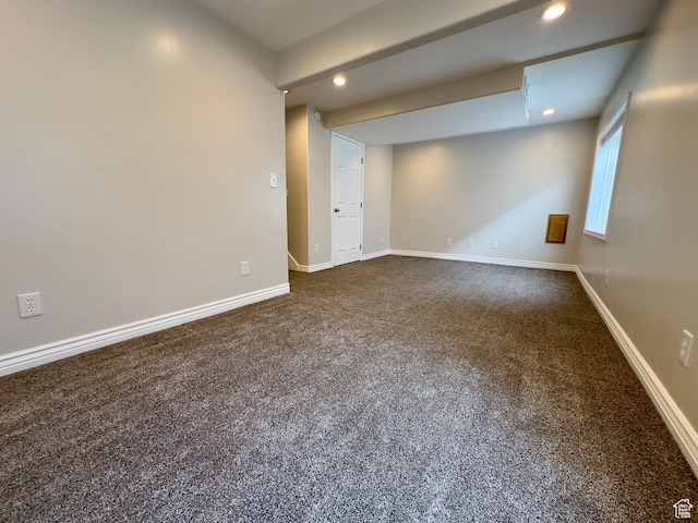 unfurnished room featuring recessed lighting, dark colored carpet, and baseboards