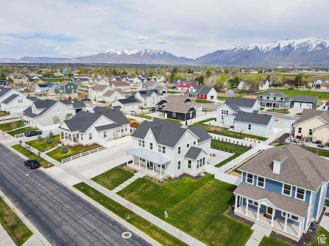 aerial perspective of suburban area featuring a mountain backdrop