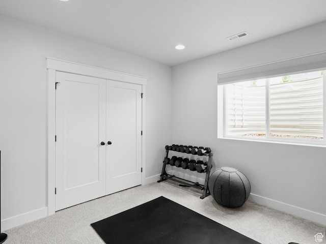 workout area featuring baseboards, carpet, and recessed lighting