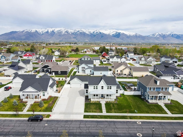 aerial perspective of suburban area featuring a mountain backdrop