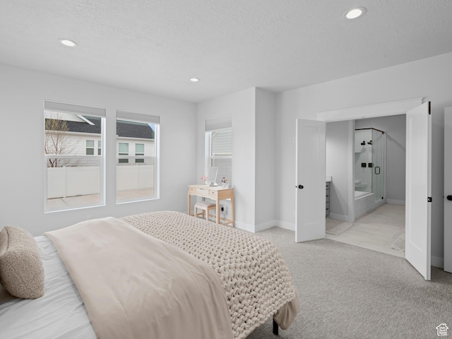 bedroom with light carpet, recessed lighting, a textured ceiling, and baseboards