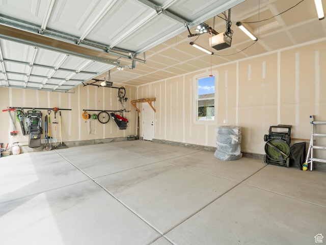 garage featuring a garage door opener