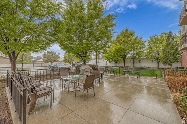 3944 S 900 E Unit 203, Millcreek, UT 84124 - view of patio / terrace featuring fence and outdoor dining space