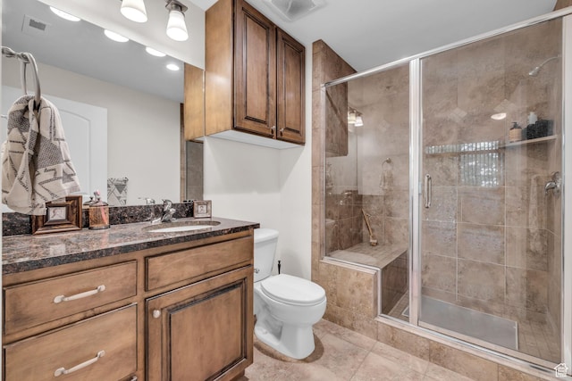3944 S 900 E Unit 203, Millcreek, UT 84124 - bathroom featuring visible vents, toilet, and a stall shower