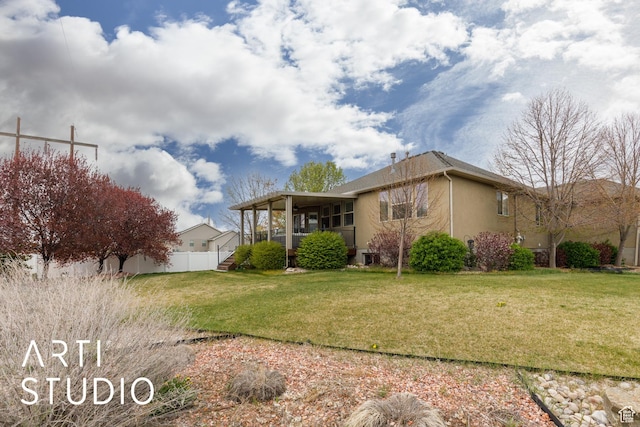 277 N Havenwood Dr W, Kaysville, UT 84037 - view of front of property featuring a front lawn, stucco siding, and fence