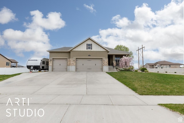 277 N Havenwood Dr W, Kaysville, UT 84037 - craftsman-style home featuring a garage, a front yard, concrete driveway, and fence