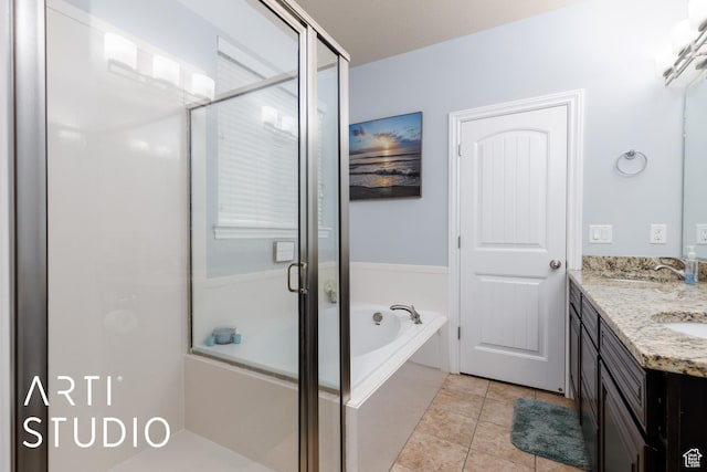 277 N Havenwood Dr W, Kaysville, UT 84037 - bathroom featuring a shower stall, a garden tub, tile patterned floors, a sink, and double vanity