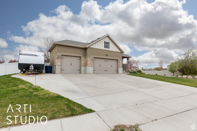 277 N Havenwood Dr W, Kaysville, UT 84037 - view of property exterior featuring concrete driveway, fence, a lawn, and a garage