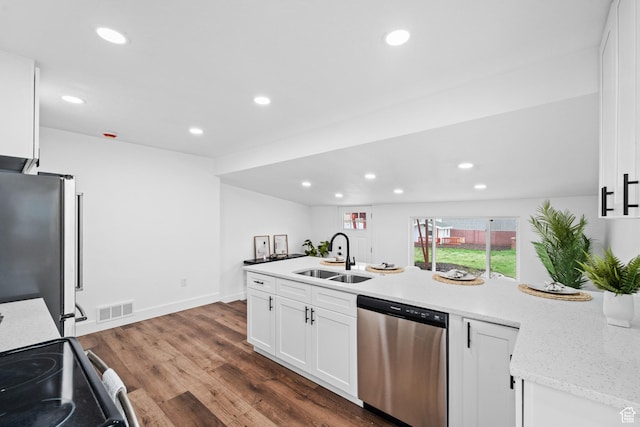 1131 W Simondi Ave N, Salt Lake City, UT 84116 - kitchen featuring a sink, visible vents, recessed lighting, dark wood-type flooring, and appliances with stainless steel finishes