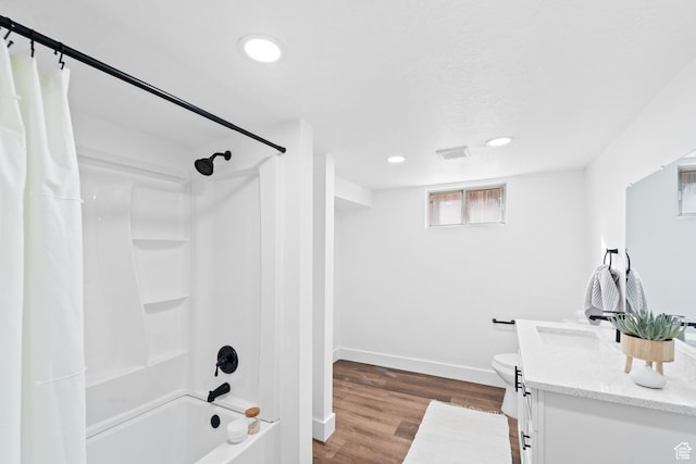 1131 W Simondi Ave N, Salt Lake City, UT 84116 - bathroom with shower / bathtub combination with curtain, wood finished floors, visible vents, vanity, and baseboards