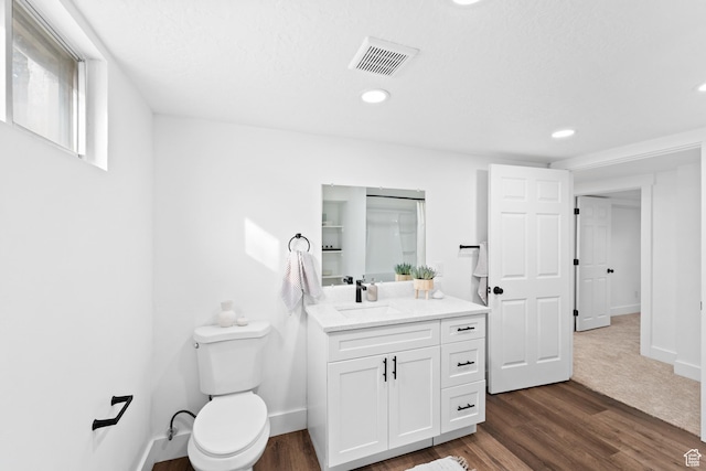 1131 W Simondi Ave N, Salt Lake City, UT 84116 - bathroom with toilet, wood finished floors, visible vents, and baseboards