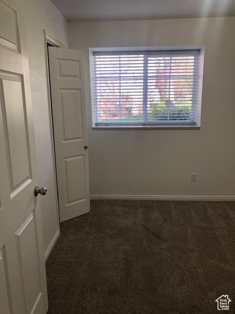 1529 W Westbury Way Unit C, Lehi, UT 84043 - unfurnished room with baseboards and dark carpet