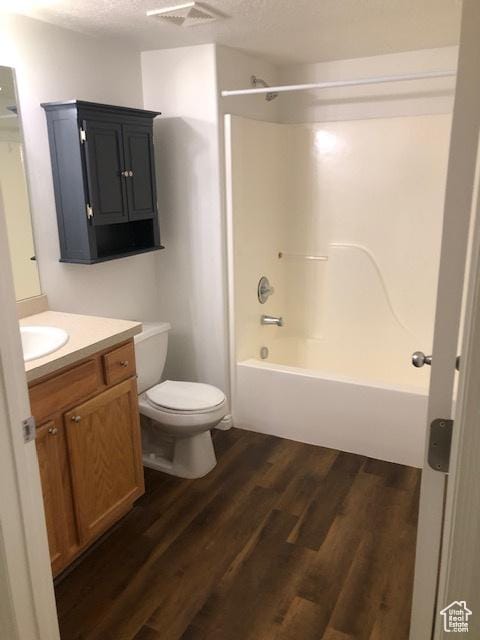 1529 W Westbury Way Unit C, Lehi, UT 84043 - bathroom featuring toilet, visible vents, shower / washtub combination, wood finished floors, and vanity
