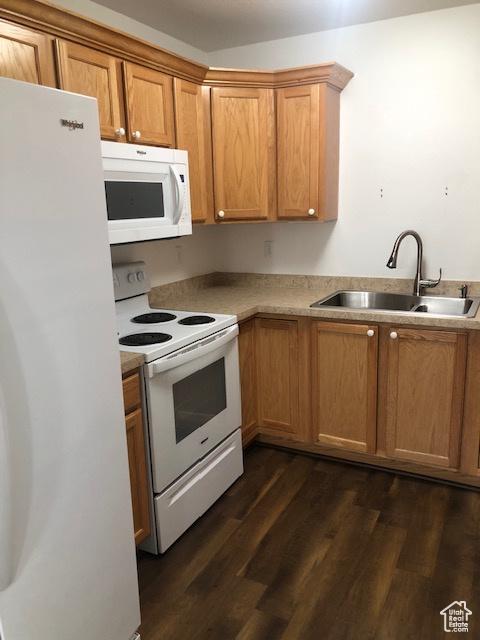 1529 W Westbury Way Unit C, Lehi, UT 84043 - kitchen featuring dark wood-style flooring, a sink, white appliances, and light countertops