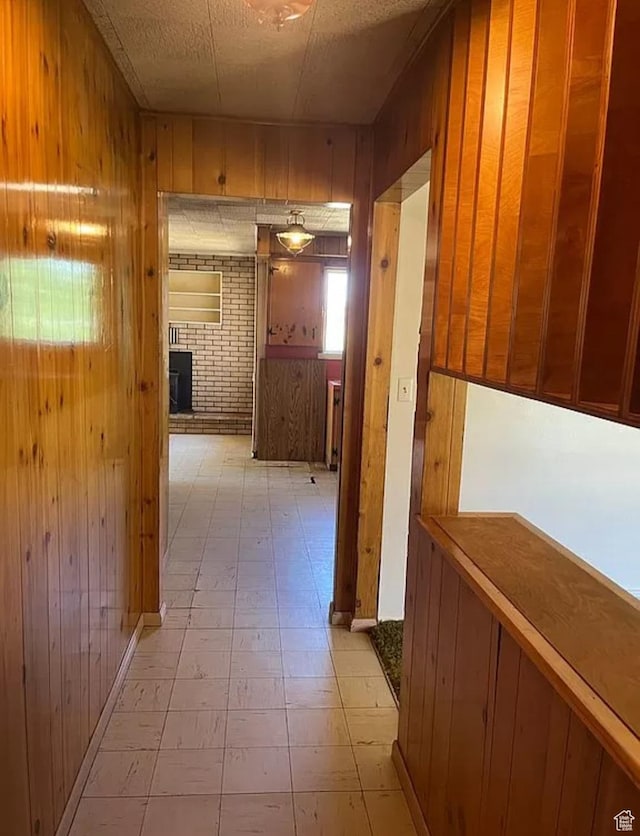 3440 S 4000 E, Vernal, UT 84078 - hall featuring wood walls and light floors