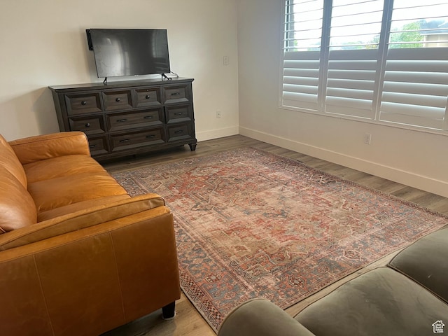3415 W N Pln, City Road, Plain City, UT 84404 - living area with baseboards and wood finished floors