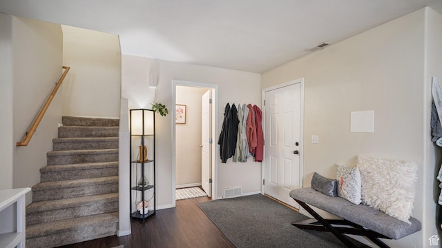 6661 W Merlot Way, West Jordan, UT 84081 - entryway featuring stairway, baseboards, dark wood-type flooring, and visible vents