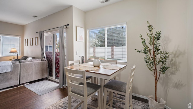 6661 W Merlot Way, West Jordan, UT 84081 - dining area with visible vents and wood finished floors