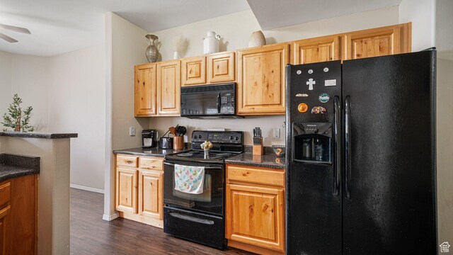 6661 W Merlot Way, West Jordan, UT 84081 - kitchen featuring dark wood-style flooring, dark countertops, baseboards, a ceiling fan, and black appliances