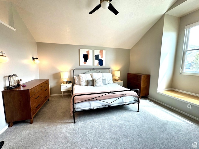 977 S Via La Costa Way, Kaysville, UT 84037 - bedroom featuring light carpet, vaulted ceiling, baseboards, and a ceiling fan