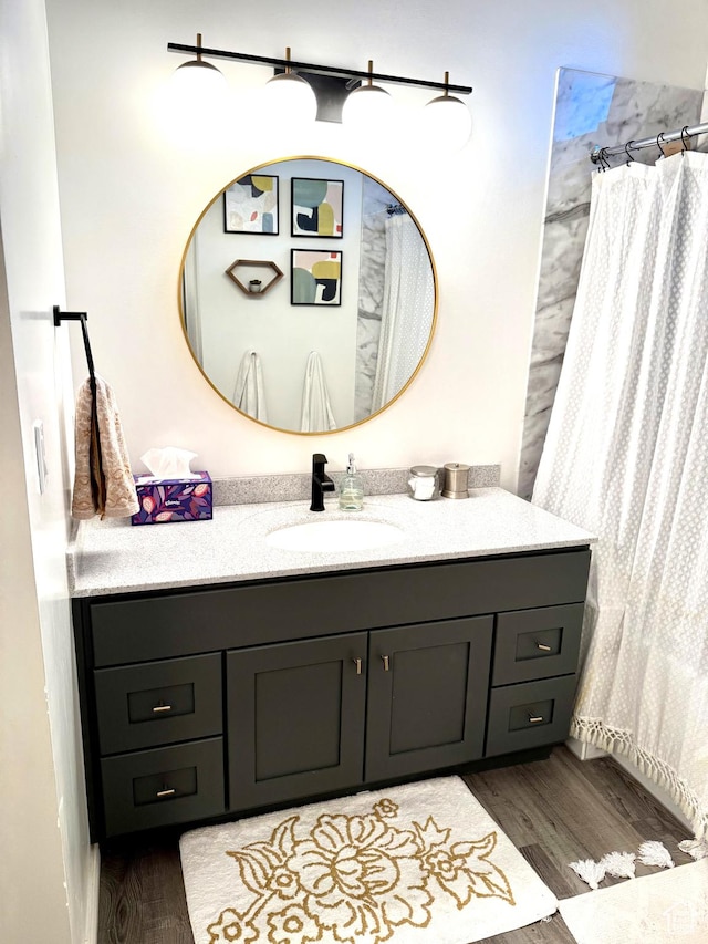 977 S Via La Costa Way, Kaysville, UT 84037 - full bath featuring wood finished floors, vanity, and a shower with shower curtain