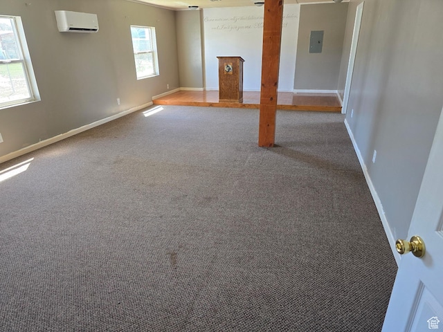 380 N 200 W, Fillmore, UT 84631 - unfurnished living room with electric panel, baseboards, carpet flooring, and a wall unit AC