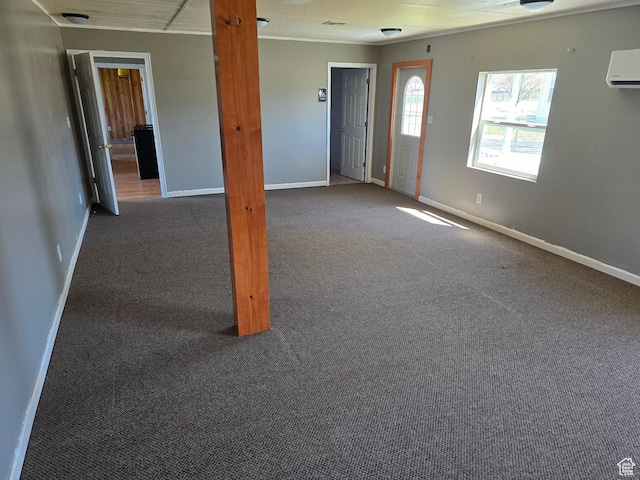 380 N 200 W, Fillmore, UT 84631 - unfurnished living room featuring a wall mounted air conditioner, carpet floors, and baseboards