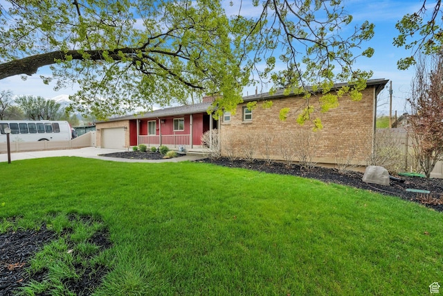 1936 E La Cresta Dr, Cottonwood Heights, UT 84121 - ranch-style home featuring fence, a front lawn, driveway, brick siding, and a garage
