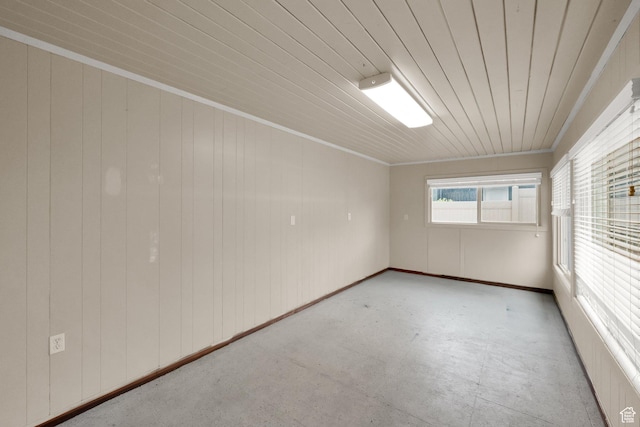 1936 E La Cresta Dr, Cottonwood Heights, UT 84121 - empty room with concrete floors, crown molding, and wood ceiling