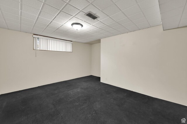 1936 E La Cresta Dr, Cottonwood Heights, UT 84121 - basement featuring dark colored carpet, visible vents, and a paneled ceiling