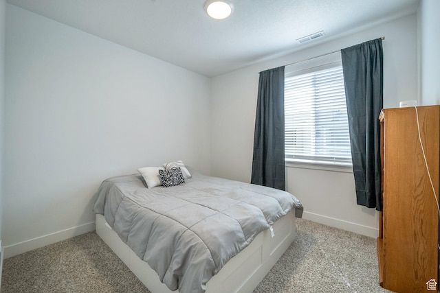 13537 S Commodus Dr W Unit 304, Riverton, UT 84096 - carpeted bedroom featuring baseboards and visible vents