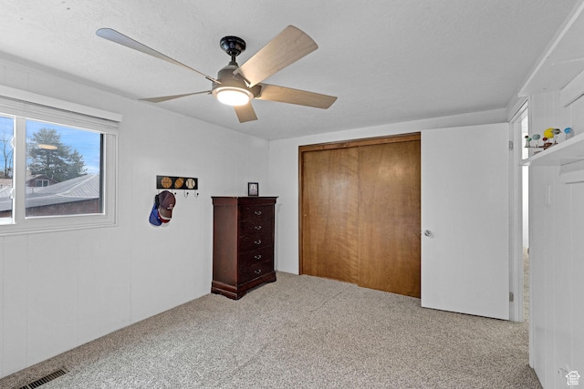 275 E 1st S, Preston, ID 83263 - unfurnished bedroom with ceiling fan, carpet floors, visible vents, and a closet
