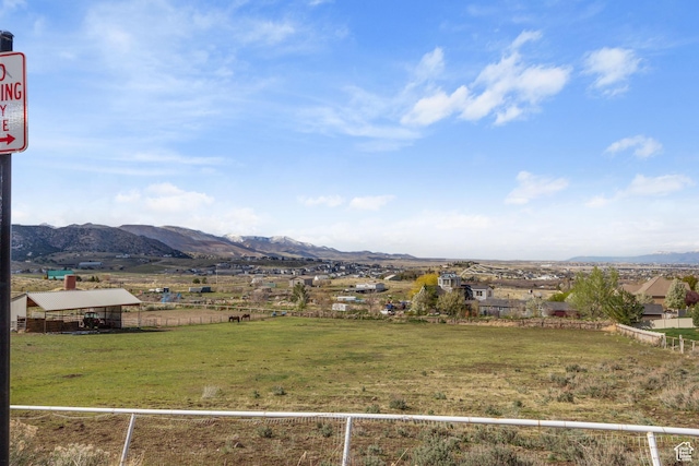 6982 W Majestic View Ln S, Herriman, UT 84096 - view of yard with fence, a rural view, and a mountain view