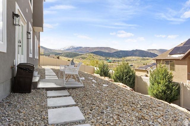 6982 W Majestic View Ln S, Herriman, UT 84096 - view of yard with a patio, a fenced backyard, and a mountain view