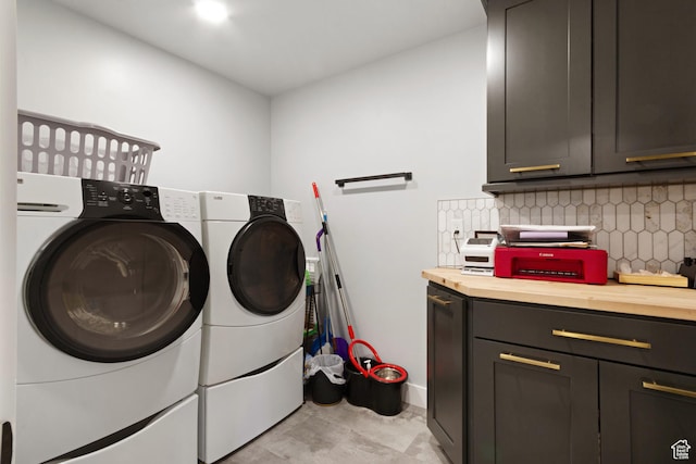 6982 W Majestic View Ln S, Herriman, UT 84096 - laundry area featuring separate washer and dryer, baseboards, and cabinet space