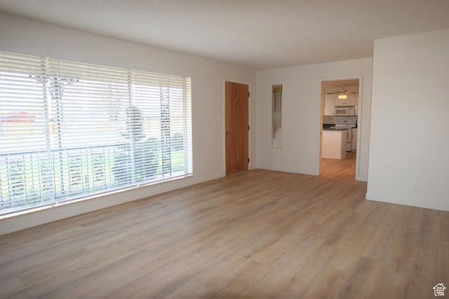 1974 W 5200 S, Roy, UT 84067 - empty room with light wood-type flooring