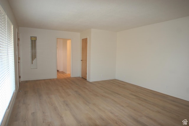 1974 W 5200 S, Roy, UT 84067 - empty room with light wood finished floors and baseboards