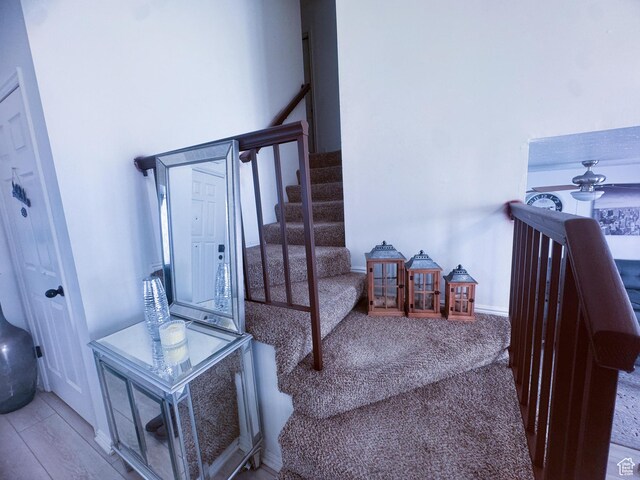 1689 W Crystal Ridge Dr S, West Jordan, UT 84084 - staircase featuring baseboards and carpet