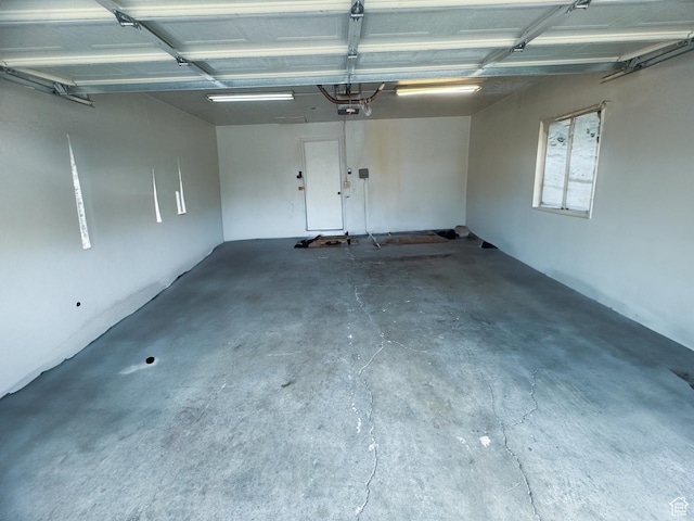 1689 W Crystal Ridge Dr S, West Jordan, UT 84084 - garage featuring a garage door opener
