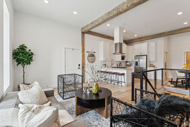 living room featuring recessed lighting and light wood-style floors