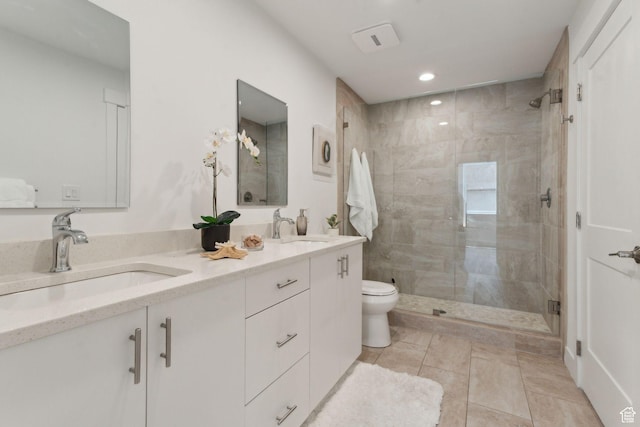 full bathroom featuring a shower stall, toilet, double vanity, recessed lighting, and tile patterned floors