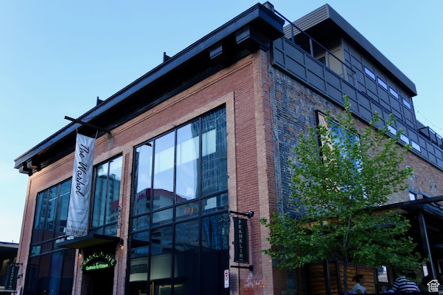 view of home's exterior featuring brick siding