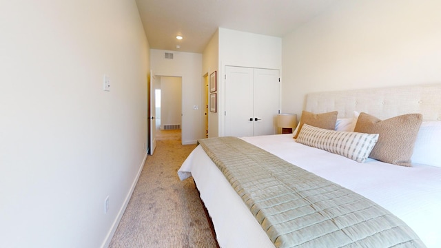 1822 S 930 E Unit 541, Heber City, UT 84032 - bedroom with light carpet, baseboards, visible vents, and a closet