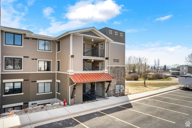 35 E 150 S Unit E301, Garden City, UT 84028 - view of property featuring uncovered parking