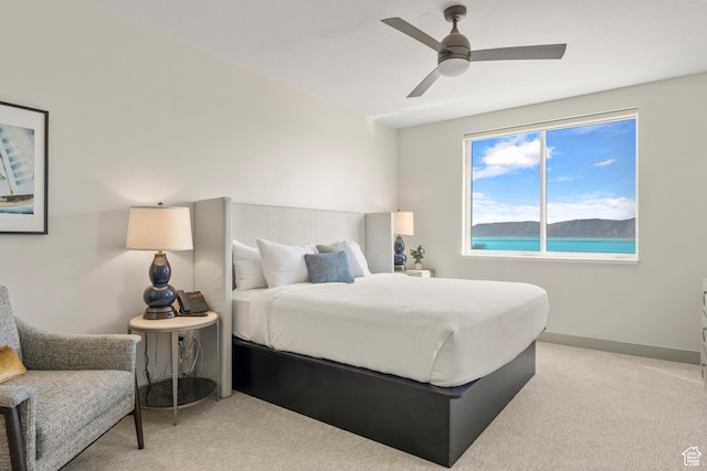 35 E 150 S Unit E301, Garden City, UT 84028 - bedroom with light carpet and ceiling fan