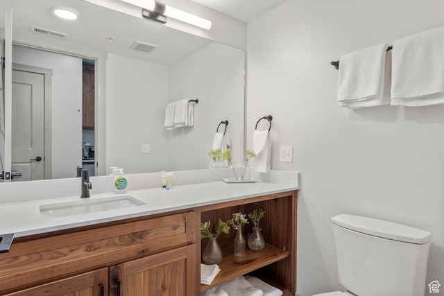 35 E 150 S Unit E301, Garden City, UT 84028 - bathroom featuring visible vents, toilet, and vanity