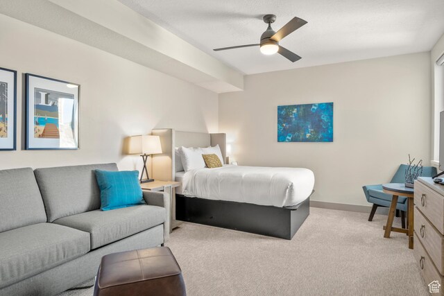 35 E 150 S Unit E301, Garden City, UT 84028 - bedroom featuring ceiling fan, carpet floors, and baseboards