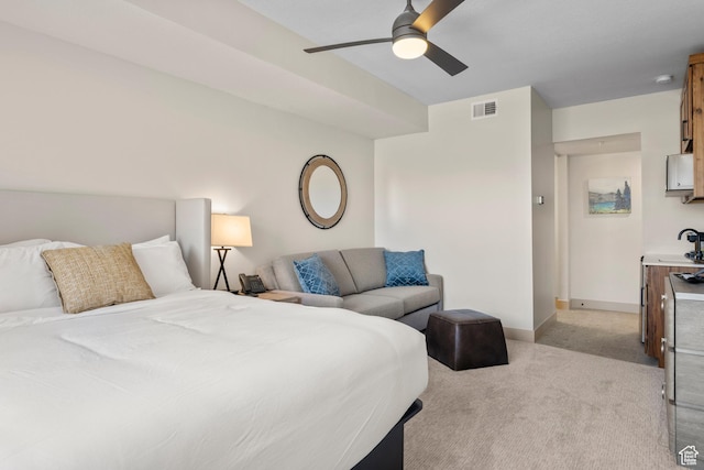 35 E 150 S Unit E301, Garden City, UT 84028 - bedroom featuring a sink, ceiling fan, light carpet, baseboards, and visible vents