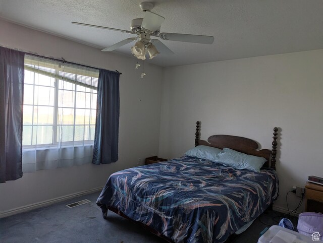 1006 S 1040 W, Payson, UT 84651 - bedroom featuring carpet flooring, ceiling fan, a textured ceiling, and baseboards