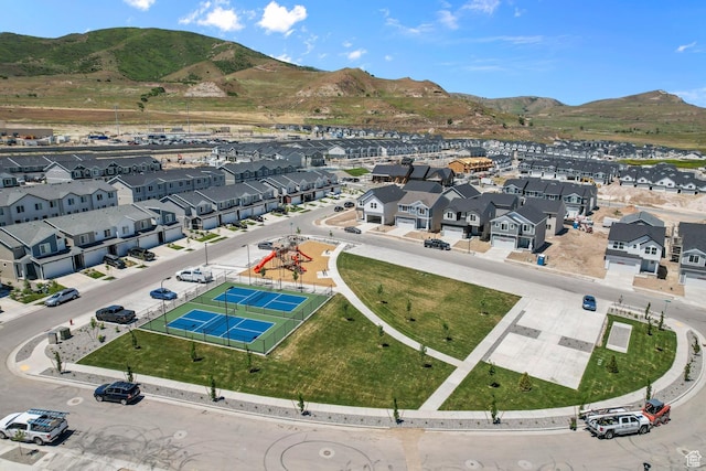 bird's eye view featuring a residential view and a mountain view